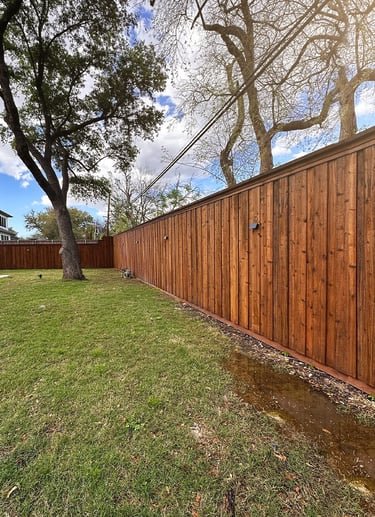 Board-on-board cedar fence built by Estrada Fencing in Dallas County